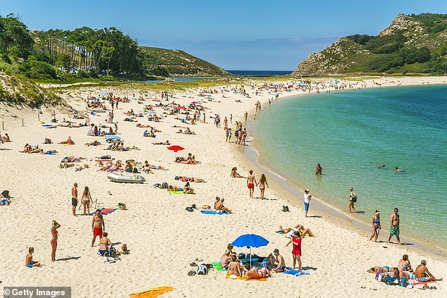 British tourists will be fined £645 for going to the toilet in Spanish sea under new rules 