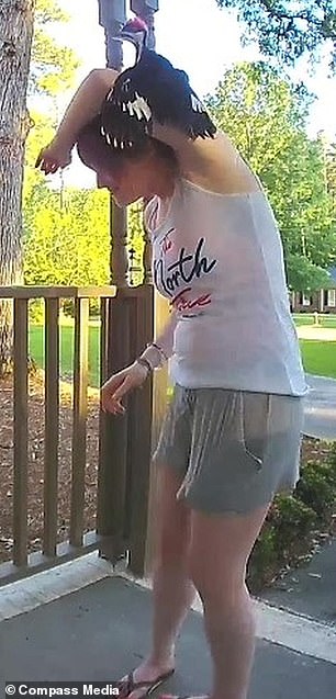Video shows baby woodpecker becoming entangled in a woman’s HAIR before being painstakingly released