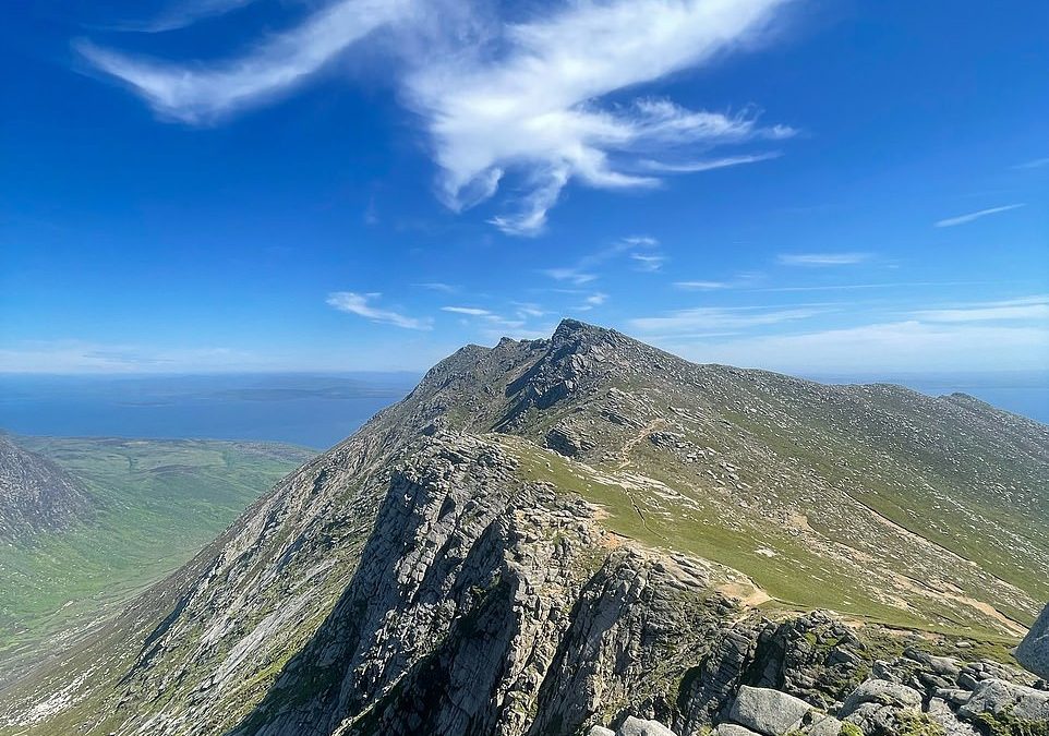 You cannot be cirrus: Cloud shaped like an eagle soars in the skies over the Isle of Arran 