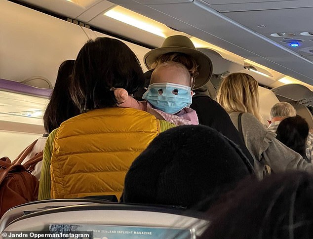Baby in Covid mask on NZ plane sparks furious debate