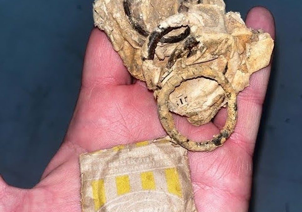 CONDOMS, a pistol and enigma machines are among items from Nazi U-boat examined for first time