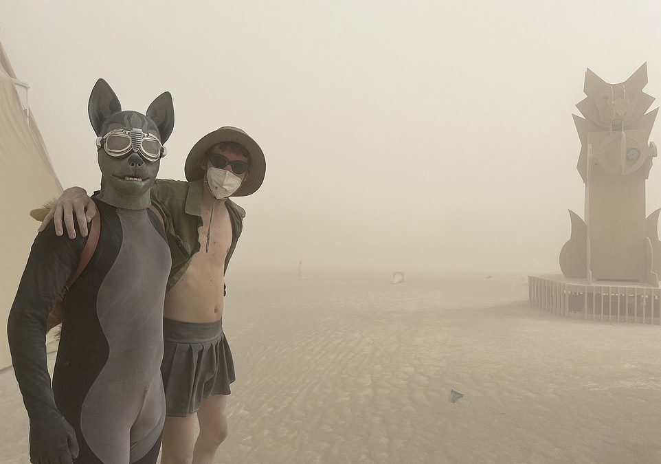 Burning Man partiers battered by sandstorm that threatens to ruin final day of Nevada festival
