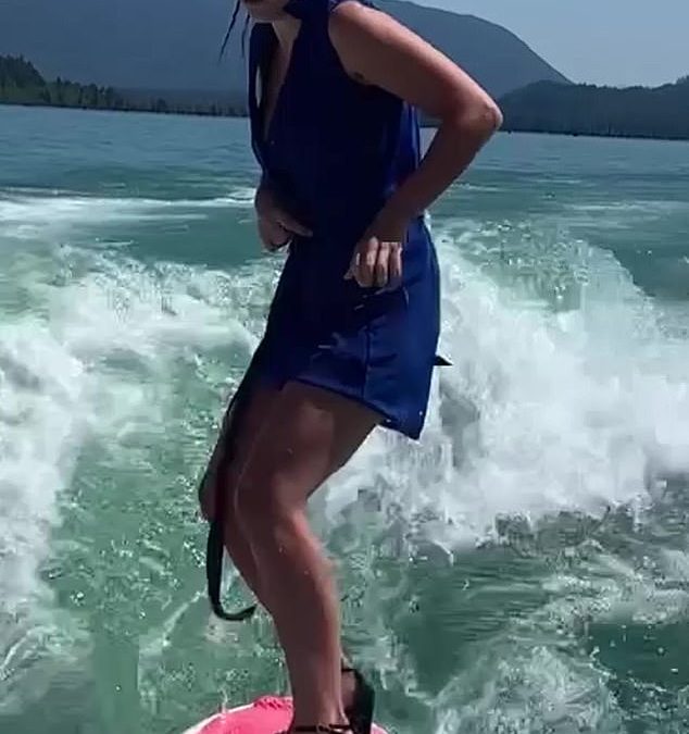 Woman reveals how she surfs while wearing high heels