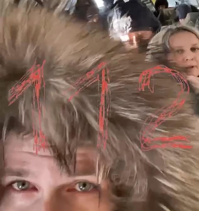 Terrifying moment plane door OPENS during Russian flight, sending passengers’ hats flying into void