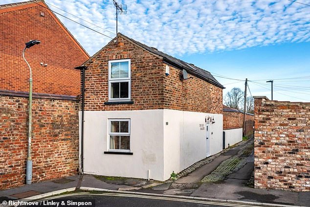 Tiny one-bed house that is just 3ft wide at its narrowest point goes on sale for £200,000 