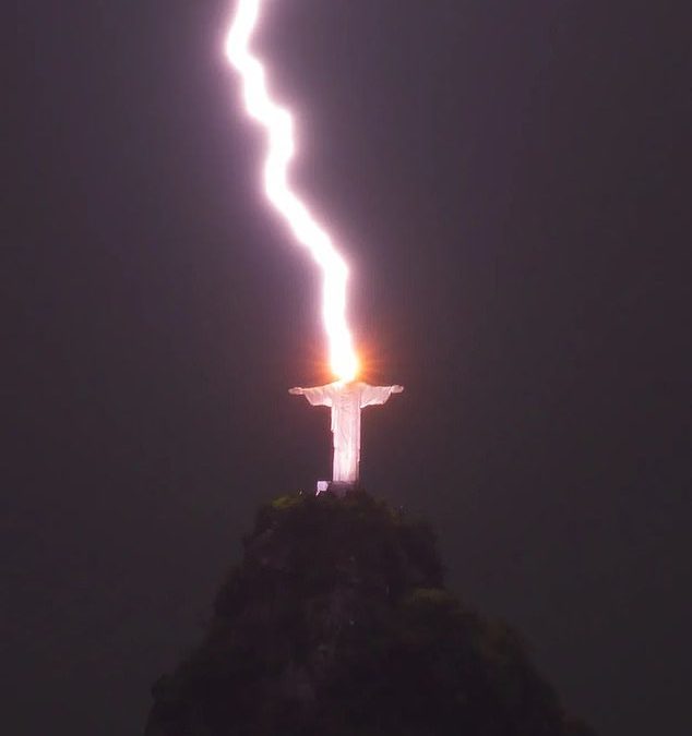 Incredible moment a huge bolt of lightning strikes world’s largest statue of Christ in Brazil