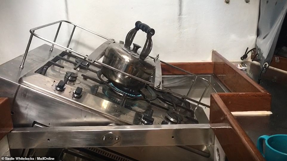 MailOnline cooks on a swinging stove during the Clipper Round the World Yacht Race