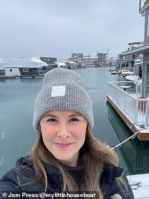 Sailing fanatic, 34, beats property market by living in a two-storey home built on pontoons