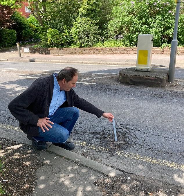 Motorist sets up an official tour taking tourists to the biggest potholes plaguing his local roads