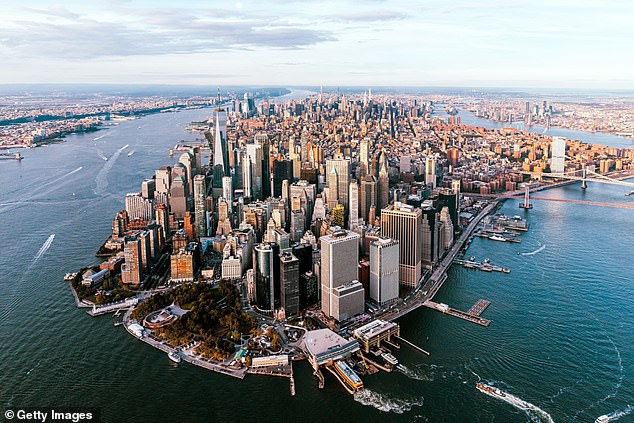 New York City is SINKING: Scientists say real estate poses more threat to city than climate change