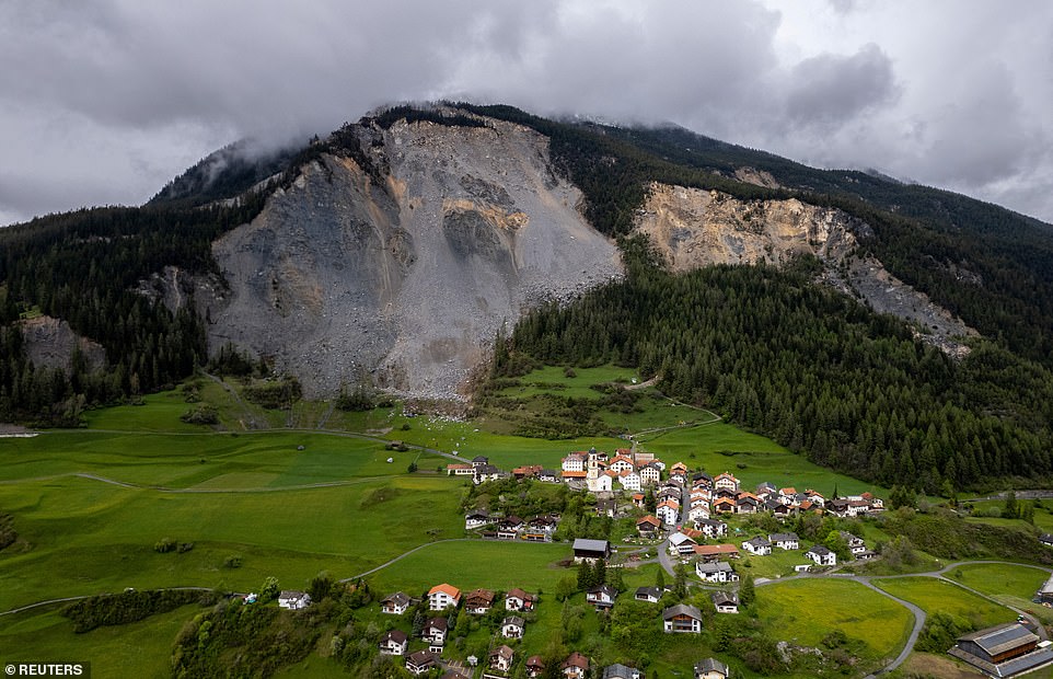The village that is about to be CRUSHED: Entire Swiss settlement evacuated because of sliding rock