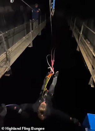 Terrifying videos show daredevils bungee jumping in the DARK