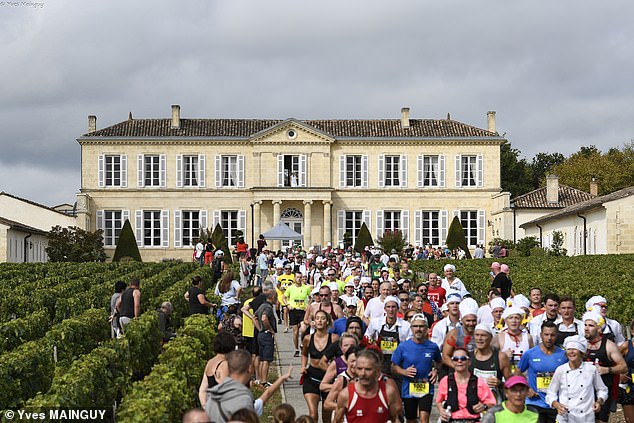 I ran the world’s booziest (and craziest) marathon, which has 23 WINE-TASTING stations and stalls with chocolate fountains, blue cheese and oysters for the runners