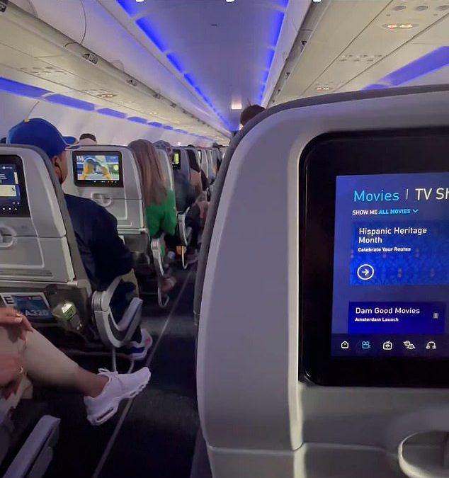 Moment airline passenger with ‘zero patience’ charges down the aisle to disembark the plane before his fellow fliers have even unbuckled… sparking huge debate about airplane etiquette