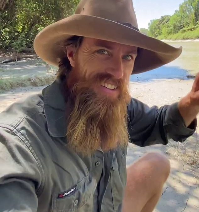 You think your daily commute to work is tough? I drive my car through an Aussie river filled with 600 starving killer crocodiles to get to my day job