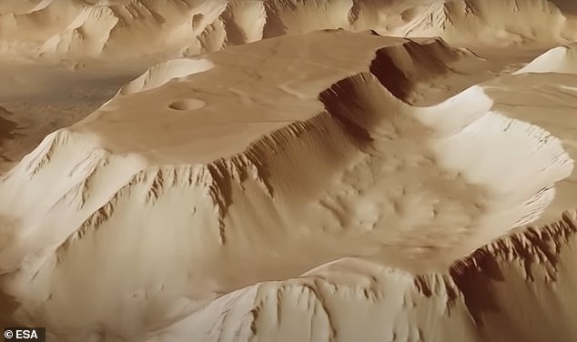 Fly across Mars’ ‘Labyrinth of Night’: Incredible video reveals what it would be like to soar over the surface of the Red Planet