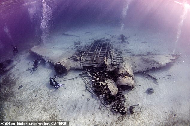 Amazing pictures show Pablo Escobar’s cocaine plane at the bottom of the Caribbean Sea: Drug-running flight crashed while trying to land on controversial Fyre Festival island