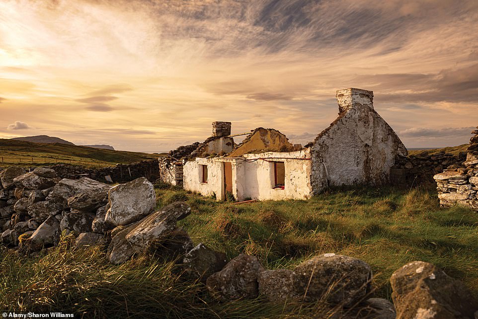 Eerie shipwrecks, a lucky stone and a forsaken castle with a ‘murder window’: Fascinating photos show Ireland’s abandoned treasures