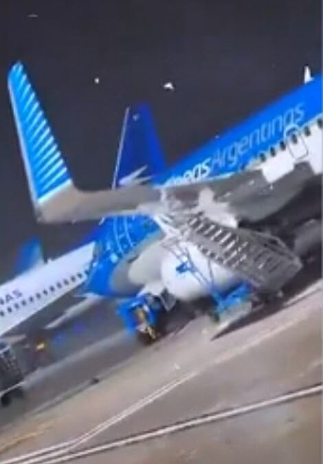 Passenger plane ‘takes off’ by itself as it is blown away by 100mph winds at Argentinian airport, smashing into staircase