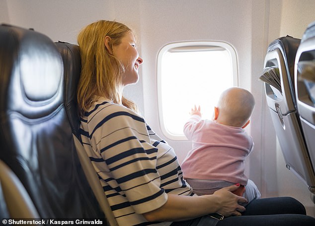 FAA warns parents to stop holding babies in their laps on planes amid fears infants could be SUCKED OUT of aircraft if more doors blow off commercial airlines