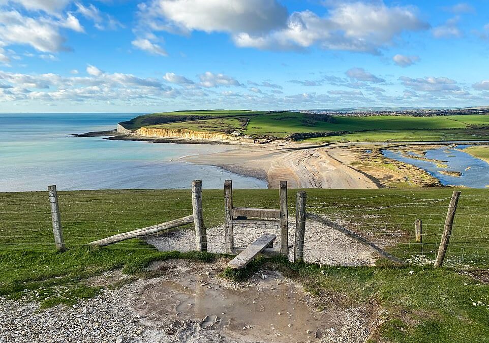 Spellbinding pictures reveal stunning British hiking trails, from the Sussex coast to the Lake District and Scotland’s turquoise beaches
