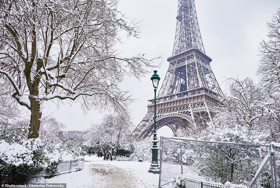 Snowcapped castles, frosty fairytale villages and spellbinding frozen lakes: Beautiful images that show how many of the world’s most iconic destinations look at their best… in winter