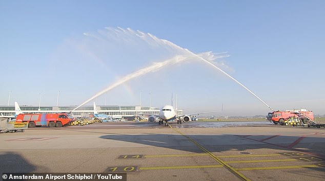 Aviation experts reveal fascinating reason why planes are sometimes sprayed with WATER when they land