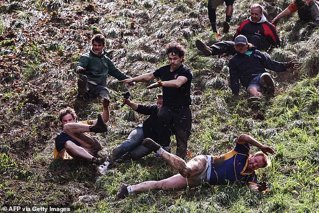 Say cheeeese…or should that be Käse?: German man wins first prize in Gloucestershire’s famous annual Bank Holiday cheese-rolling event