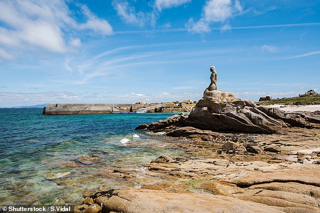 Pictured: The secret uninhabited Spanish island you’ve never heard of – with unspoiled beaches and mermaid legends (and only 250 people are allowed to visit per day)