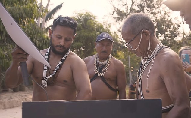 Remote Brazilian tribe are given the internet… and are now viewing graphic porn, falling for online scams and hooked on social media
