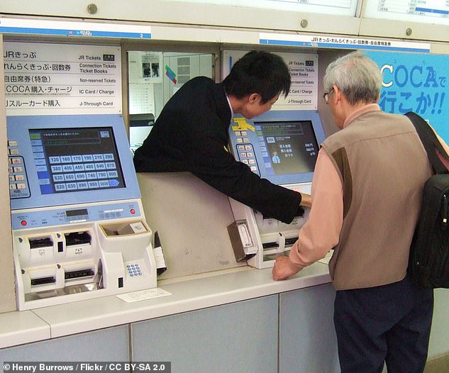 Pictured: How pressing the ‘help’ button on an automatic ticket machine at a Japanese railway station can have a VERY surprising result…