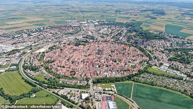 Pictured: The incredible German town that sits in an asteroid crater and is smothered in 72,000 tonnes of DIAMONDS