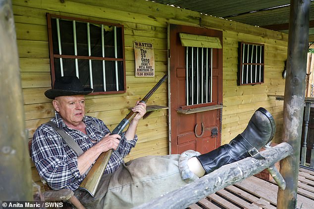 I turned my garden into an 1850s Wild West town: Care home worker transforms his house by building two jails, a sheriff’s office, a blacksmith’s and a cannon