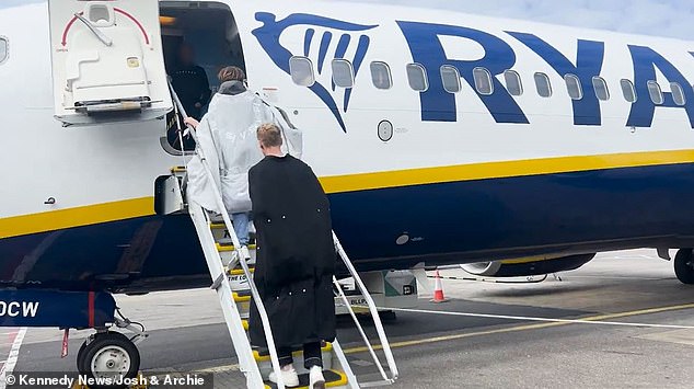 To avoid paying £300 Ryanair fees, holidaymakers stuff specially made coat with 30kg of luggage, including clothes, kettle and a portable SOFA