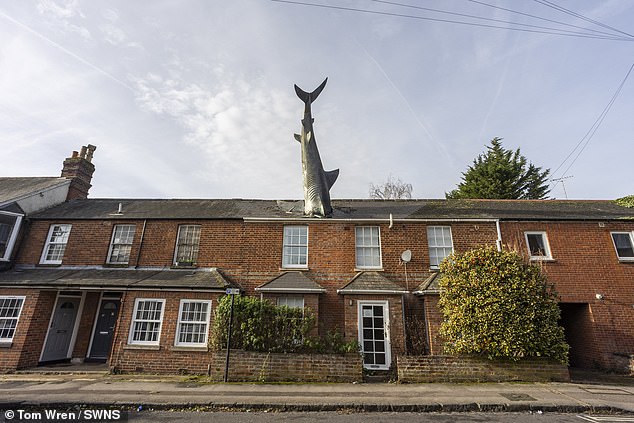 Iconic Victorian terraced home with a SHARK sticking out of roof could be yours for £3,500-a-month