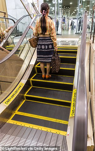 Pictured: The world’s shortest escalator, which has just five steps and a journey time of six seconds